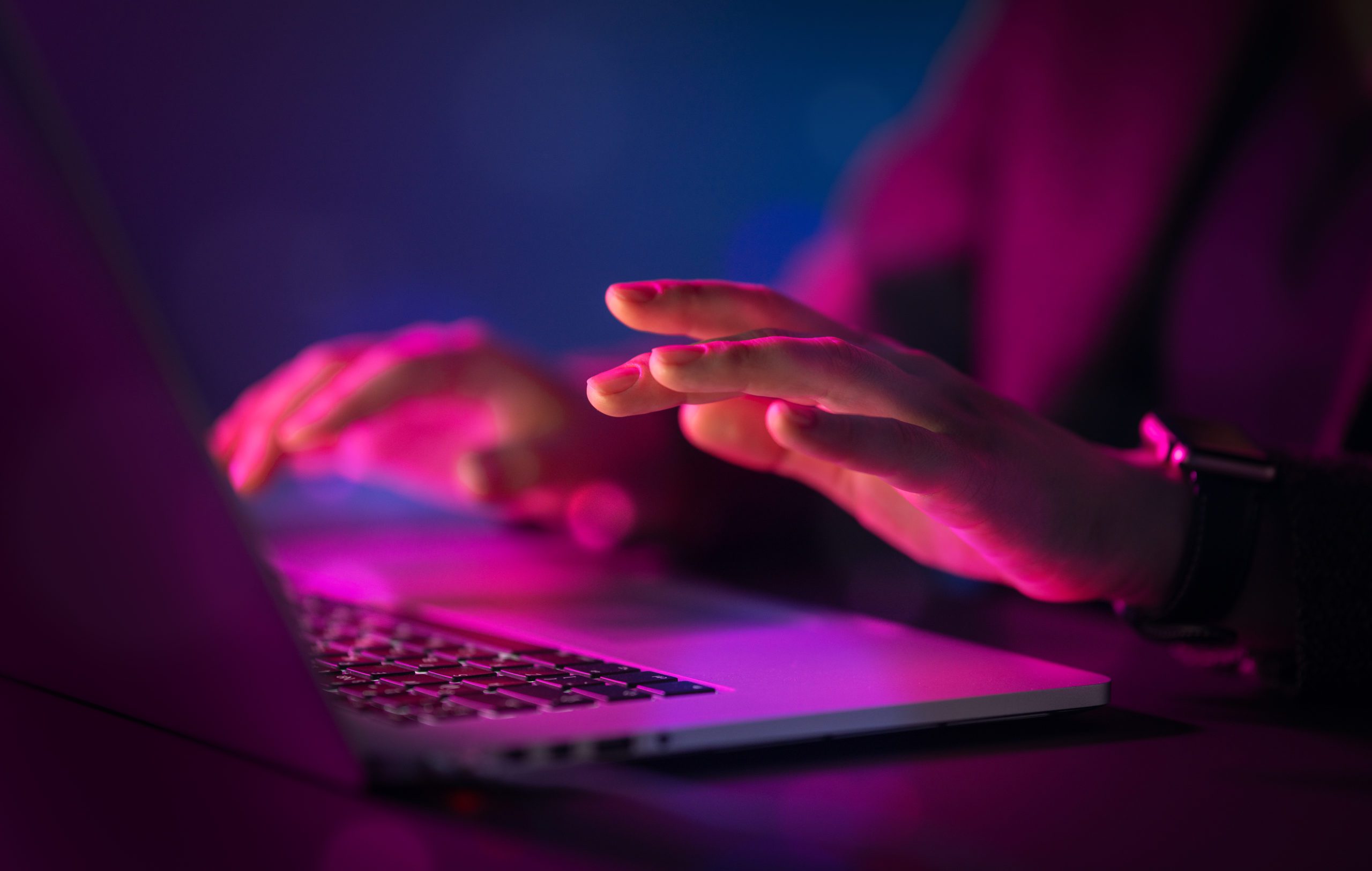 Computer and hands close up